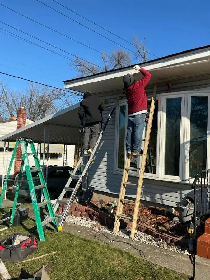 Restoration crew performing exterior repair in Deerfield
